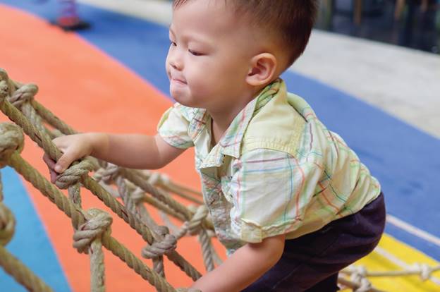 physical activity for child cancer baby by climbing rope